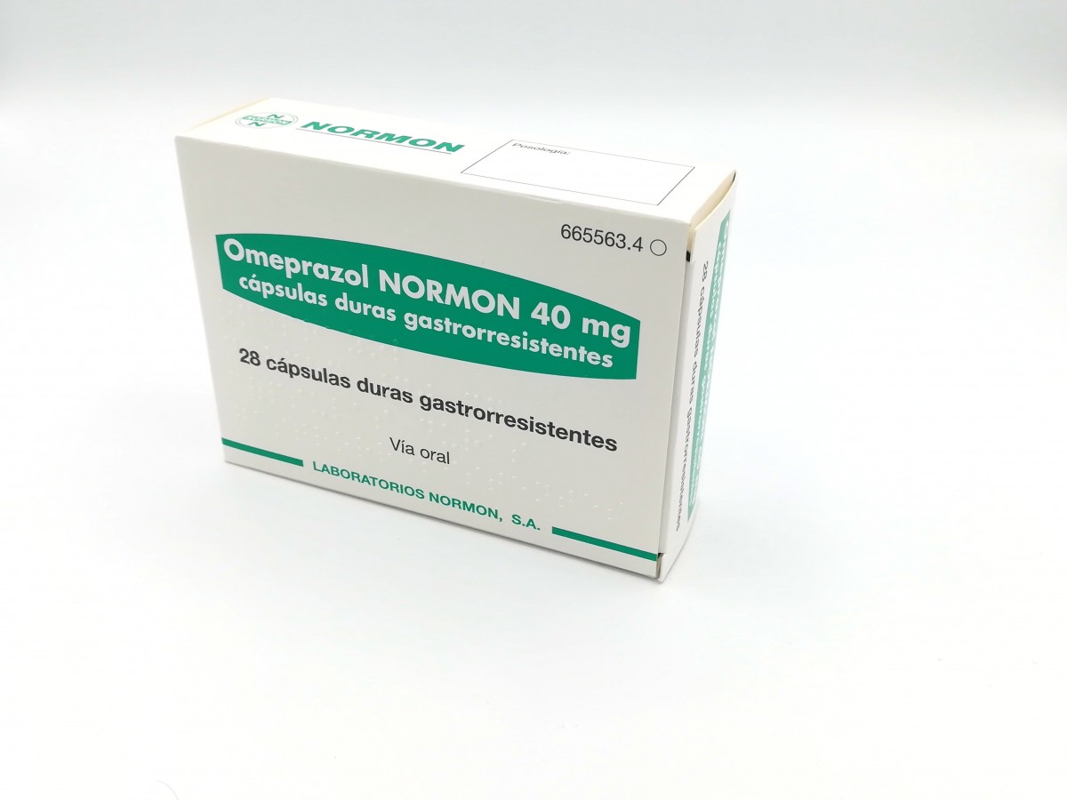OMEPRAZOL NORMON 40 mg CAPSULAS DURAS GASTRORRESISTENTES , 14 cápsulas fotografía del envase.