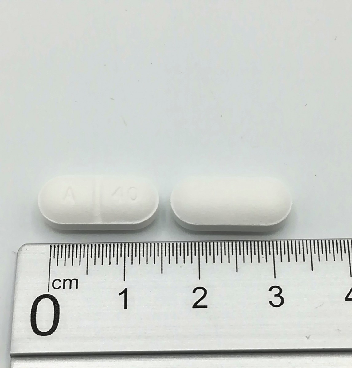 ATORVASTATINA NORMON 40 mg COMPRIMIDOS RECUBIERTOS CON PELICULA EFG , 500 comprimidos fotografía de la forma farmacéutica.