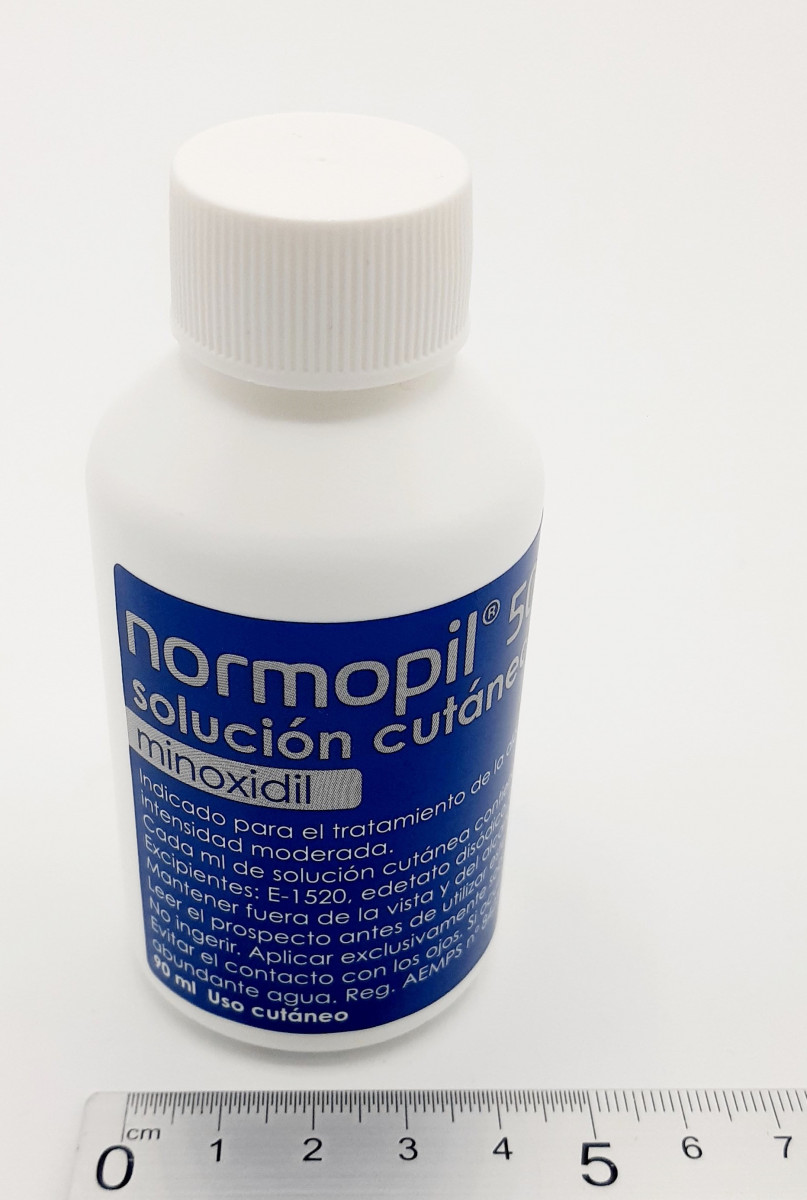 NORMOPIL 50 MG/ML SOLUCION CUTANEA, 2 frascos de 90 ml (180 ml) fotografía de la forma farmacéutica.