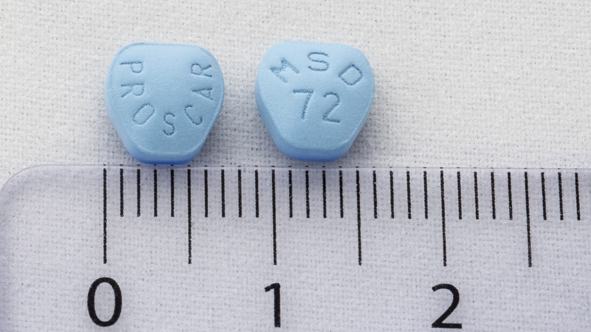 PROSCAR 5 mg COMPRIMIDOS RECUBIERTOS CON PELÍCULA , 28 comprimidos fotografía de la forma farmacéutica.